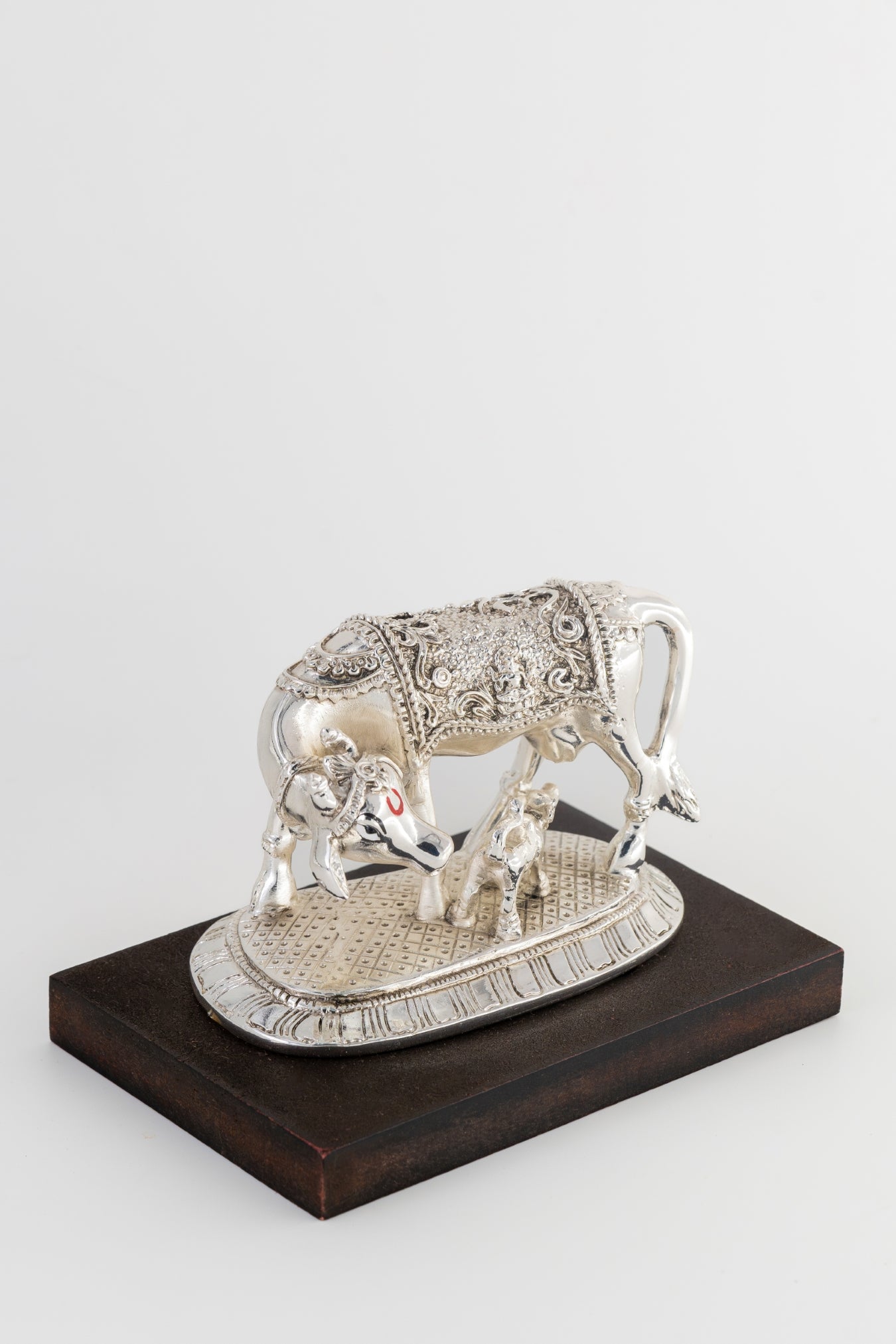 Silver-Foiled Kamdhenu Cow & Calf Figurine on Wooden Base – 5in × 7in