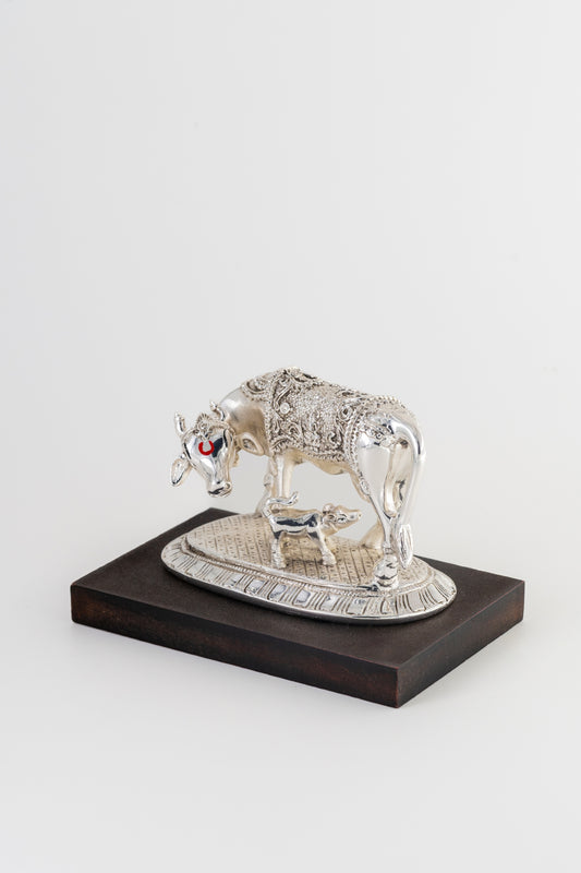 Silver-Foiled Kamdhenu Cow & Calf Figurine on Wooden Base – 5in × 7in